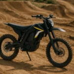 Street legal electric dirt bike with license plate riding on a public road