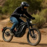 A rider pushes the Sur Ron Light Bee on a dirt trail, demonstrating how fast does a Sur Ron Light Bee go in real off-road conditions.